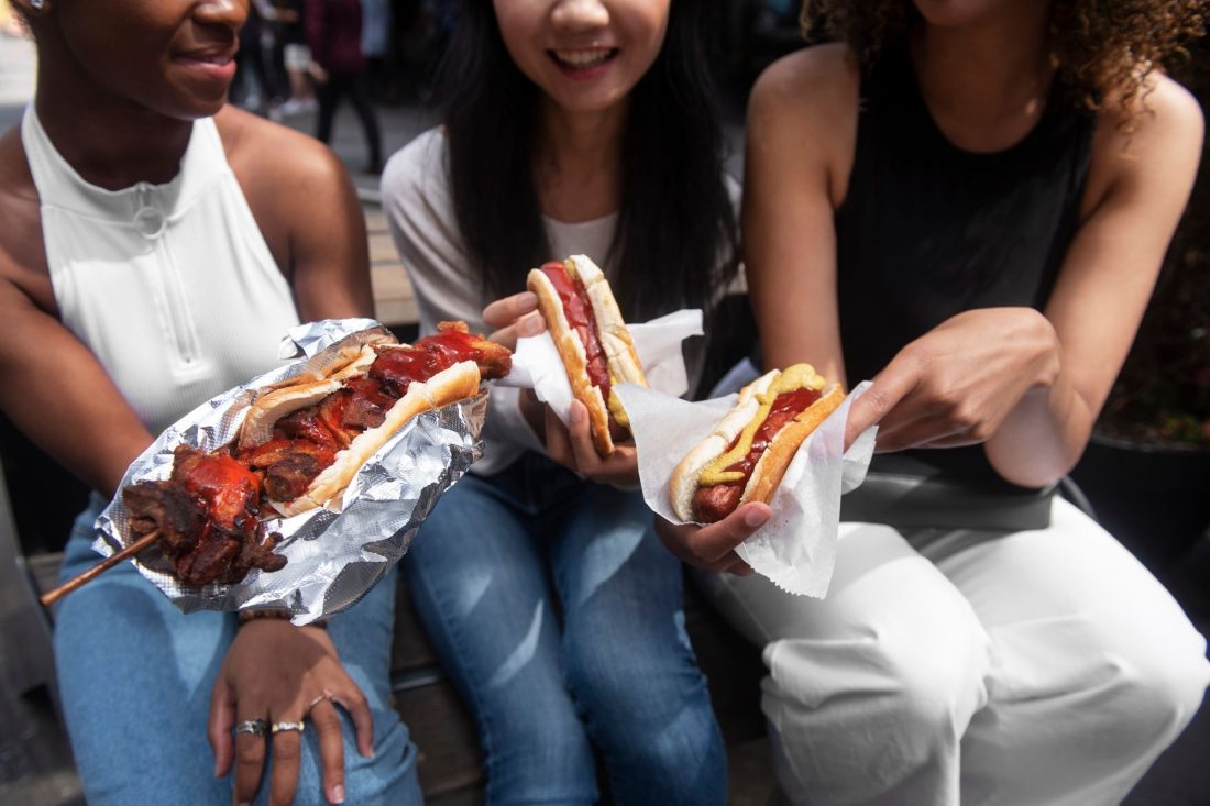 teenagers enjoying fast food