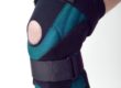 Male leg with textile knee pad on it
