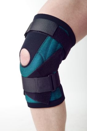 Male leg with textile knee pad on it