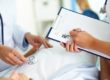 Close-up of female doctors hands during medical treatment of patient in hospital