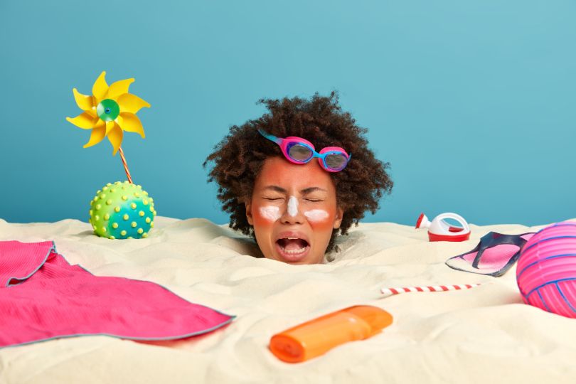 Woman on the beach before knowing sunscreen facts