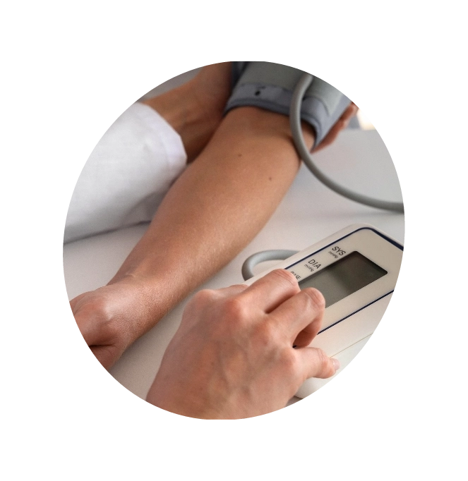 A close-up of a doctor checking the blood pressure of a patient before suggesting high blood pressure treatment.