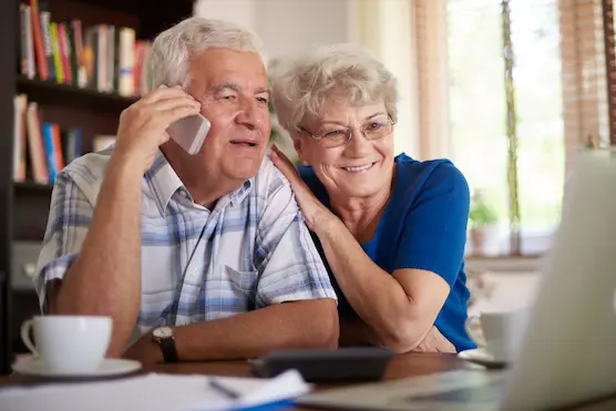 senior couple speaking to customer service of a canada online pharmacy