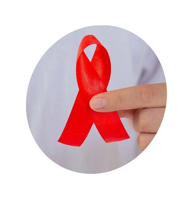 A person holding HIV Aids awareness red ribbon