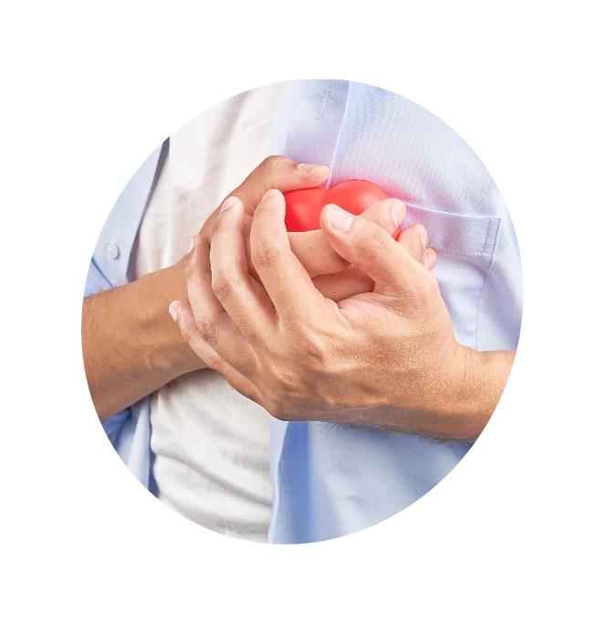 A man holding a red heart portraying Heart Arrhythmias








