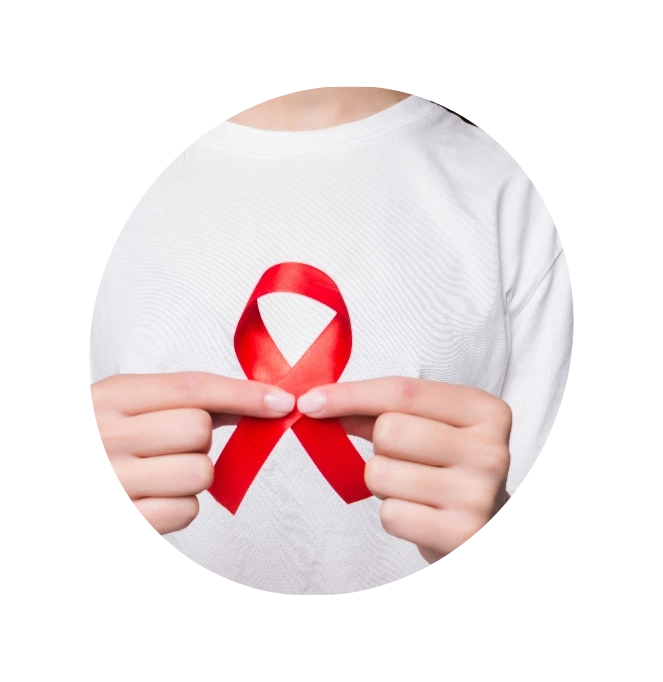 A woman holding the cancer ribbon.