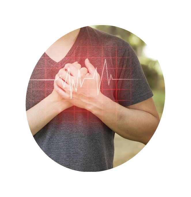 A person clutching his heart in distress due to ischemic heart disease